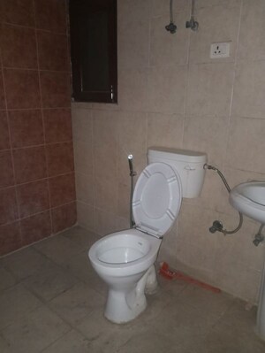Bathroom in 3 BHK Apartment at Meenal Balmukund Residency, Raj Nagar Extension – for Sale