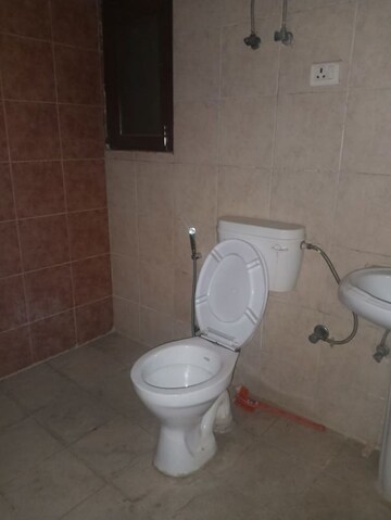 Bathroom in 3 BHK Apartment at Meenal Balmukund Residency, Raj Nagar Extension – for Sale