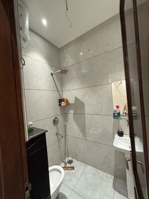 Bathroom in 3 BHK Builder Floor at Motia Blue Ridge, Dhakoli – for Rent