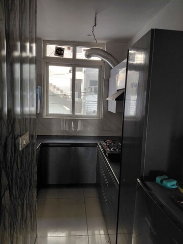 Kitchen in 3 BHK Builder Floor at Motia Blue Ridge, Dhakoli – for Rent