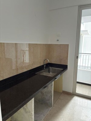 Kitchen in 3 BHK Apartment at Courtyard by Narang Realty and The Wadhwa Group, Pokhran Road No Two – for Rent