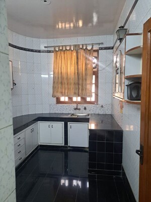 Kitchen in 6 BHK Villa at RWA Apartments Sector 41, Sector 41 – for Sale