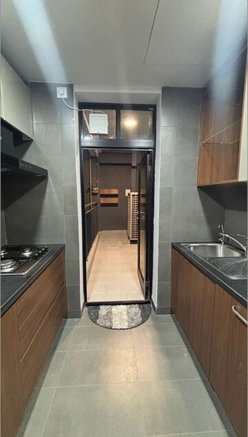 Kitchen in 2 BHK Apartment at Krisumi Waterfall Residences, Sector 36a – for Rent