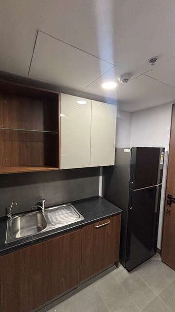 Kitchen in 2 BHK Apartment at Krisumi Waterfall Residences, Sector 36a – for Rent