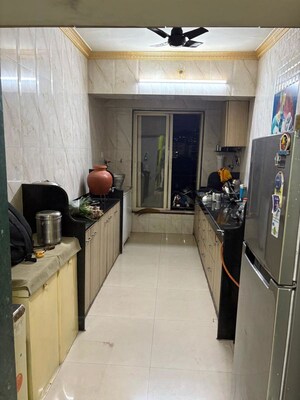 Kitchen in 2 BHK Apartment at Khadakpada – for Sale