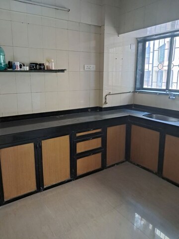 Kitchen in 2 BHK Apartment at Siddhivinayak Mandir, Vashi Sector 29 – for Rent