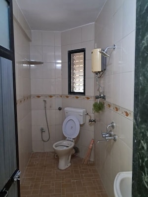 Bathroom in 2 BHK Apartment at Siddhivinayak Mandir, Vashi Sector 29 – for Rent