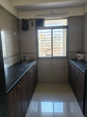 Kitchen in 2 BHK Apartment at Neelsidhi Atlantis, Nerul – for Rent