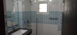 Bathroom in 3 BHK Apartment at Purvanchal Royal Park, Sector 137 – for Rent