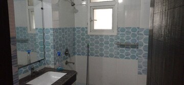 Bathroom in 3 BHK Apartment at Purvanchal Royal Park, Sector 137 – for Rent