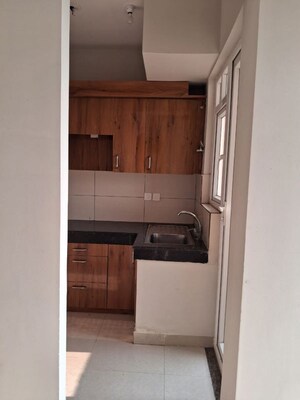 Kitchen in 2 BHK Apartment at Tata Eureka Park, Sector 150 – for Rent