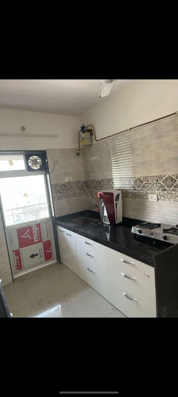 Kitchen in 2 BHK Apartment at Saisha Elite, Vazira – for Sale