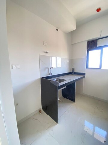 Kitchen in 1 BHK Apartment at Runwal Gardens Phase 2, Dombivli East – for Rent