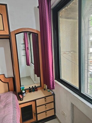 Living Room in 1 BHK Apartment at Balaji Enclave Kandivali East, Kandivali East – for Rent