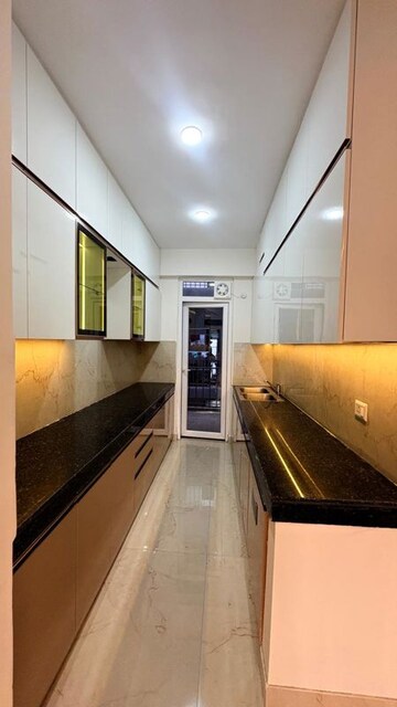 Kitchen in 3.5 BHK Builder Floor at Smart World Gems, Sector 89 – for Sale