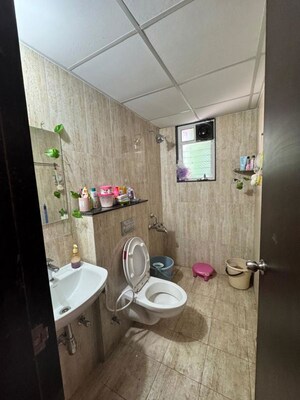Bathroom in 2 BHK Apartment at Kolte Patil R10, Hinjewadi – for Rent