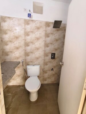 Bathroom in 3 BHK Apartment at Shivalik Sharda Park View, Shela – for Rent
