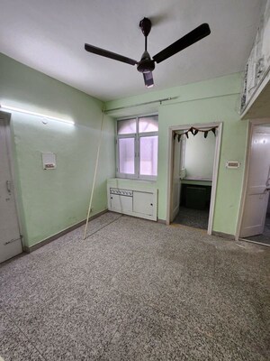 Room in 2 BHK Apartment at Karthik Apartment, Sector 21c – for Rent