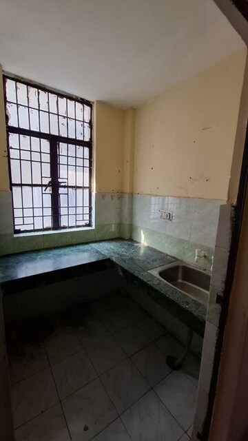 Kitchen in 1.5 BHK Apartment at Sector 10 Greater Noida – for Sale