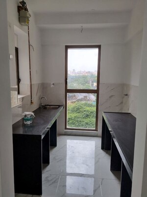 Kitchen in 2 BHK Apartment at Raymond Ten X Habitat, Pokhran Road No Two – for Sale
