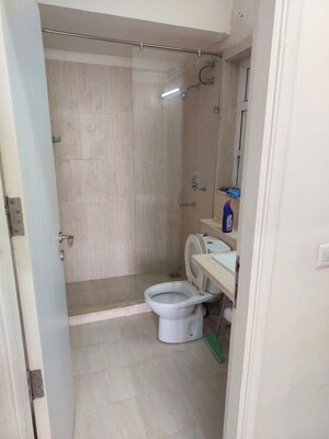 Bathroom in 3 BHK Apartment at DLF The Skycourt, Sector 86 – for Rent
