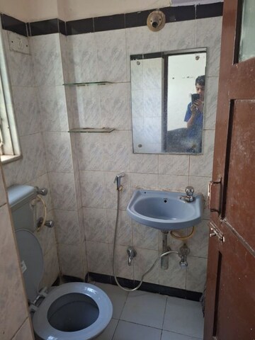 Bathroom in 1 BHK Apartment at Dheeraj Valley, Goregaon East – for Rent