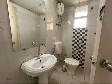 Bathroom in 2 BHK Apartment at Gaur Atulyam, Omicron I Greater Noida – for Rent