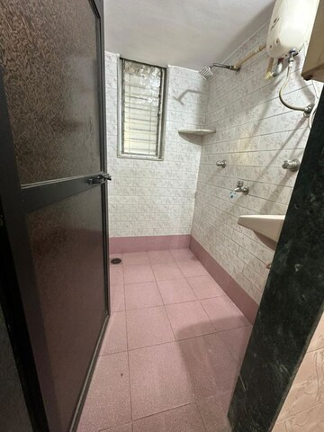 Bathroom in 1 BHK Apartment at Eden Villa CHS, Dahisar West – for Rent