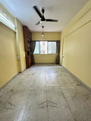 Living Room in 1 BHK Apartment at Eden Villa CHS, Dahisar West – for Rent