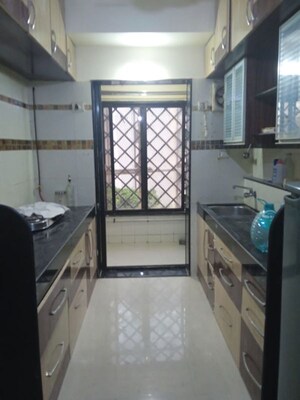 Kitchen in 3 BHK Apartment at Ashish Swapnalok Towers, Goregaon East – for Rent