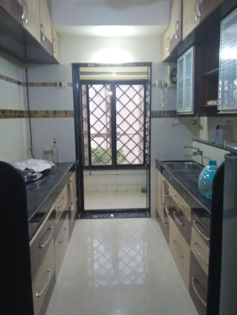 Kitchen, ashish-swapnalok-towers 3 Bedroom 1350 Sq.Ft. Apartment In Goregaon East Mumbai 9808879