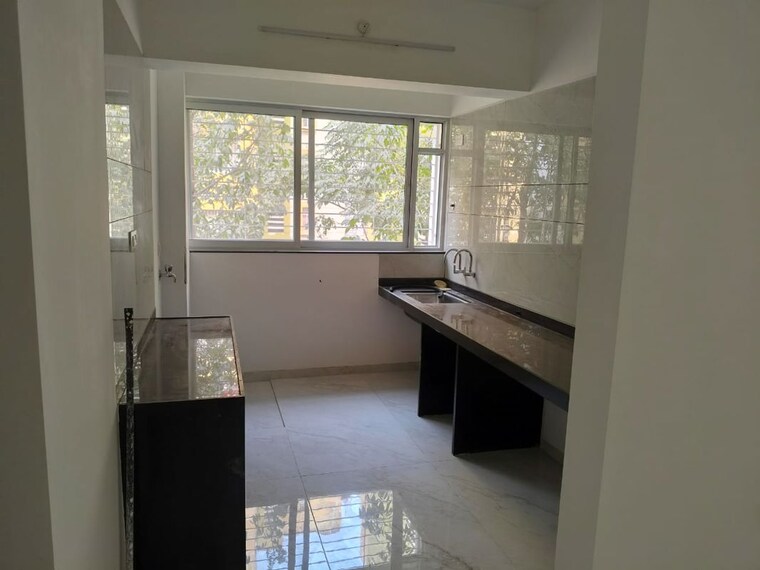 Kitchen, bhansali-whispering-winds 2 Bedroom 682 Sq.Ft. Apartment In Pashan Pune 9808928