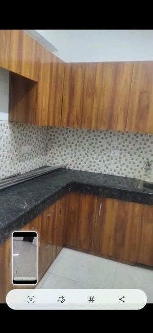 Kitchen in 2.5 BHK Apartment at Gulmohur Garden, Raj Nagar Extension – for Sale