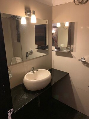 Bathroom in 3 BHK Apartment at Ajmera Cosmic Heights, Bhakti Park – for Rent