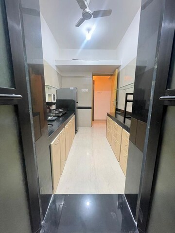Kitchen in 1 BHK Apartment at K Raheja Raheja Residency, Malad East – for Rent