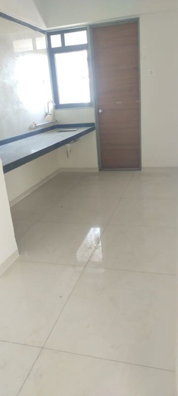 Kitchen in 2 BHK Apartment at Param Serenity, Muthiya – for Rent
