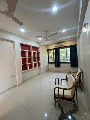 Living Room in 1 BHK Apartment at Juhu – for Rent