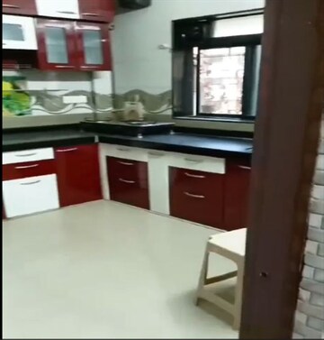 Kitchen in 1 BHK Apartment at Seawoods Sector 48 – for Sale