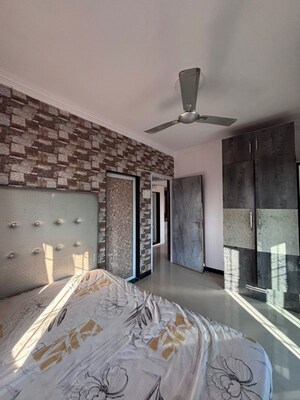 Bedroom in 2 BHK Apartment at JP Eminence, Andheri West – for Rent