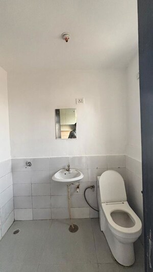 Bathroom in 1 RK Apartment at Microtek Greenburg, Sector 86 – for Sale