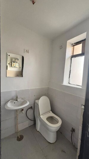 Bathroom in 1 RK Apartment at Microtek Greenburg, Sector 86 – for Sale