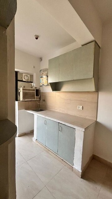 Kitchen in 1 RK Apartment at Microtek Greenburg, Sector 86 – for Sale
