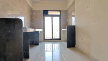 Kitchen in 2 BHK Apartment at KM Horizon Exotica, Haware City – for Rent