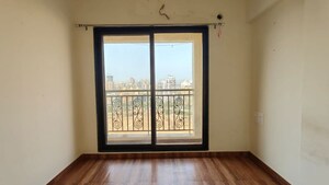 Bedroom in 2 BHK Apartment at KM Horizon Exotica, Haware City – for Rent