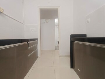 Kitchen in 1.5 BHK Apartment at Godrej Emerald, Ghodbunder Road – for Rent