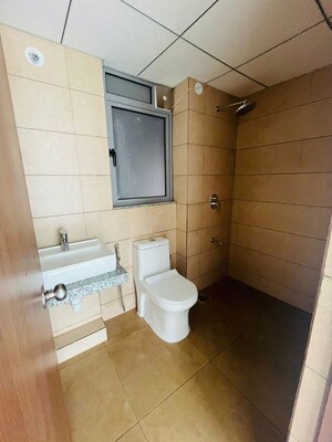 Bathroom in 1 BHK Apartment at Kalpataru Immensa, Kolshet Road – for Rent