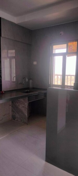 Kitchen in 2 BHK Apartment at Ajmera Crosstown One, Kalyan West – for Rent