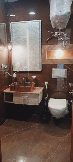 Bathroom in 4 BHK Builder Floor at Ansal Sushant Lok I, Sector 43 – for Rent