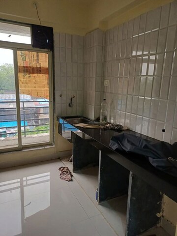 Kitchen in 1 BHK Apartment at Ram Pushpanjali Residency, Owale – for Rent