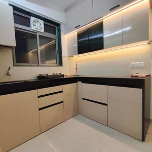 Kitchen in 2 BHK Apartment at Ram Pushpanjali Residency, Owale – for Rent